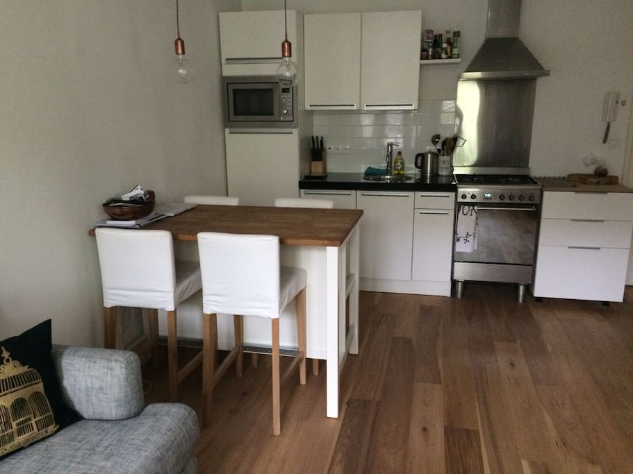 clean kitchen and 4-persons table