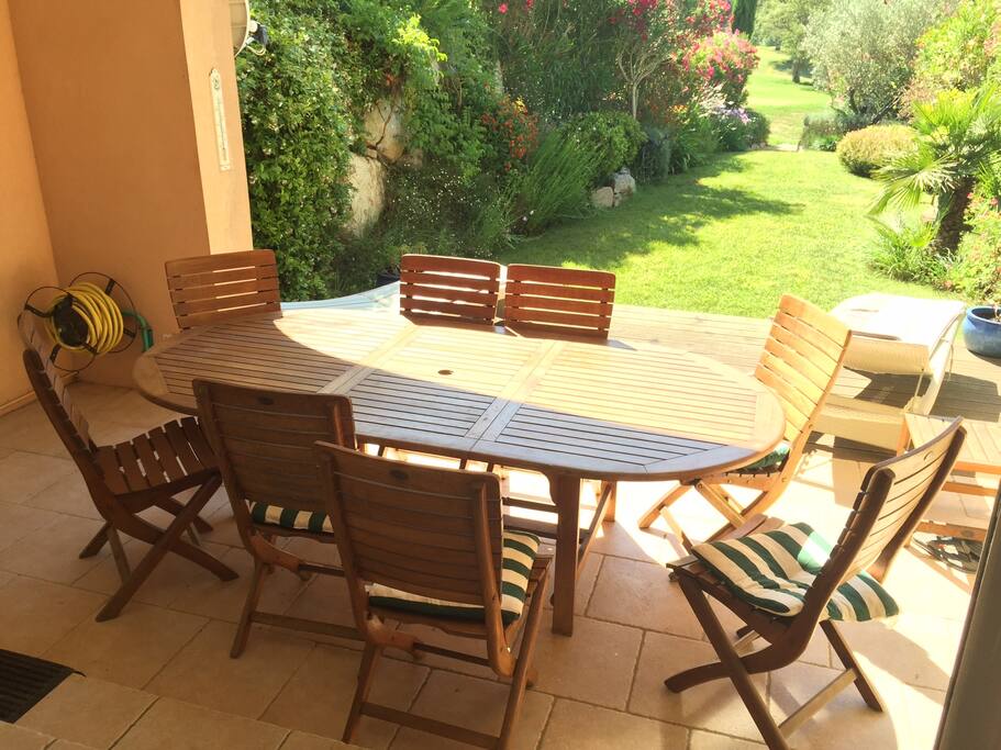 Sheltered dining looks onto our flower & sun-filled garden