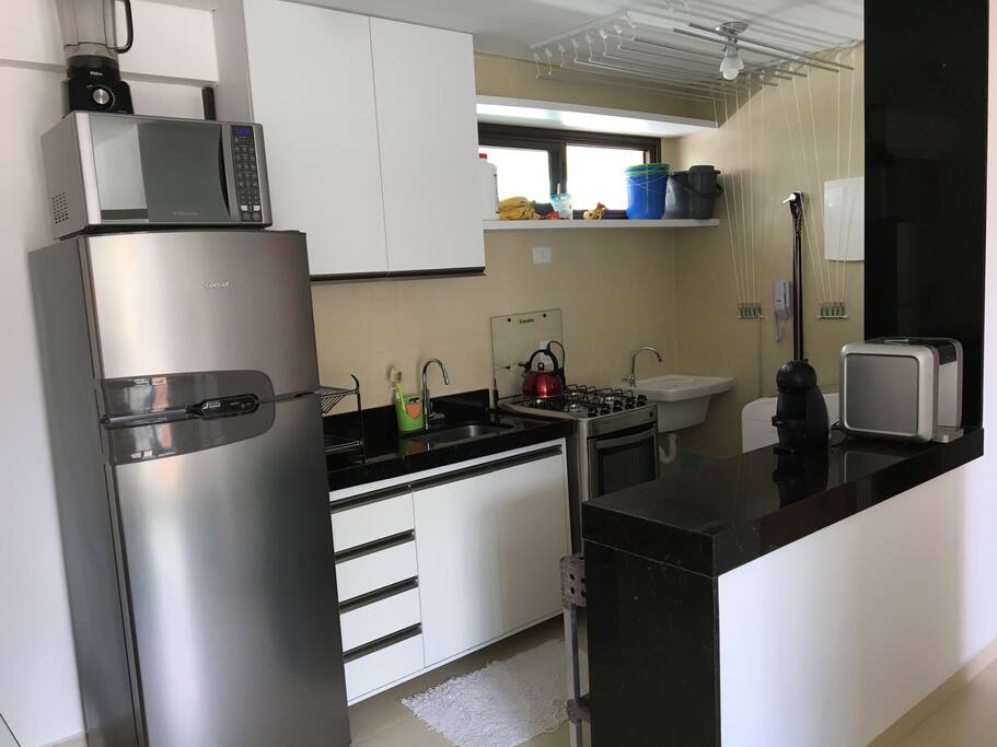 A cozinha e área de serviço
