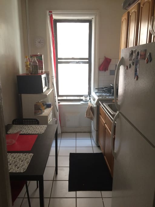 Kitchen with gas stove.