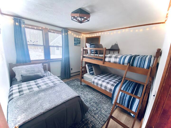 First Floor Kid’s Room~ “The Mountain Room”~ single twin bed and twin bunk beds. Closet with shelves and hangers for storage. Top bunk for ages 6-16 only please. 