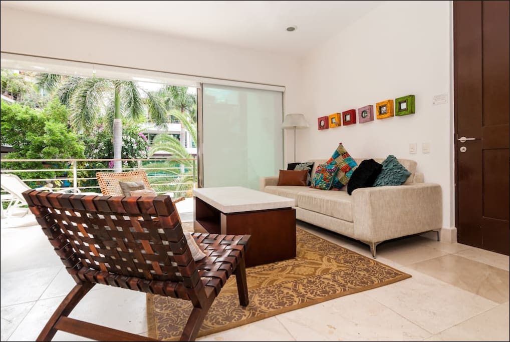 Beautifully furnished open plan living and dining area... In VIA 38, Playa's most exclusive apartment building all just steps from Mamitas beach & 5th Ave