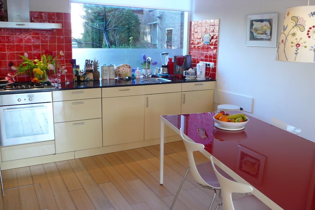 Kitchen with dishwasher and practical appliances.