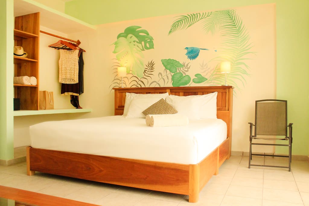 King bed, closet, sofa that can pull out for third guest. Caribbean colors highlight this large comfortable studio apartment