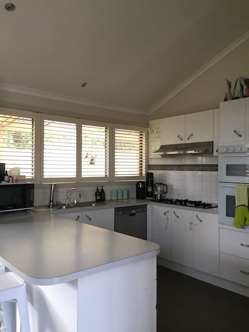 Kitchen with breakfast bar for lazy morning brunches