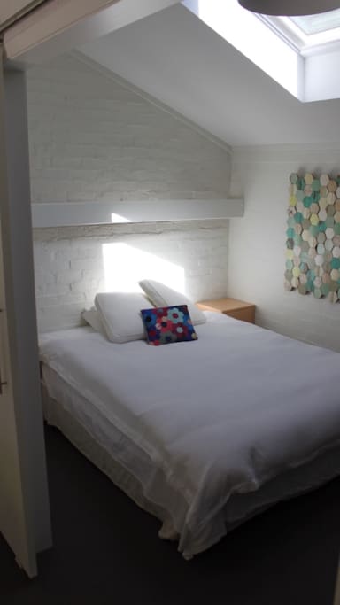 Light filled queen bedroom
