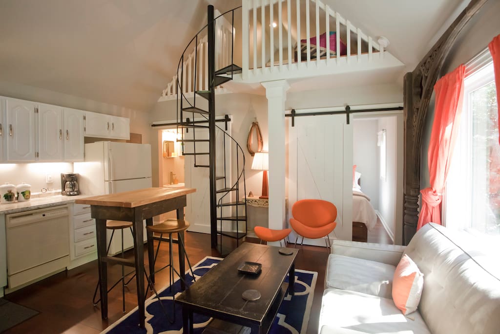 View of spiral staircase to upstairs living area.