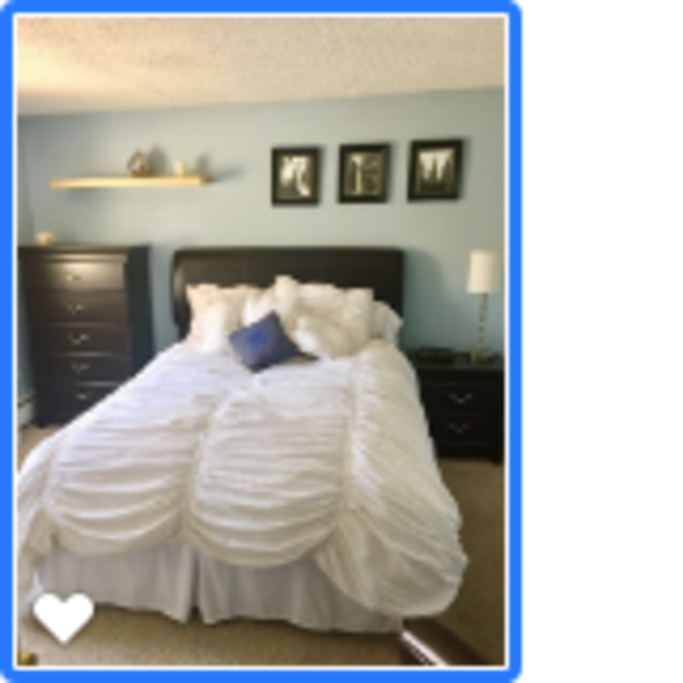 Queen bed with plenty of drawer space.