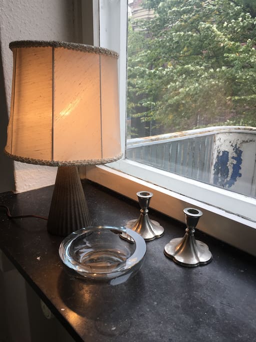Carnap in the studio with ceramic lamp, Danish royal antique holmegaard Bowl and silver candle antique by Just.