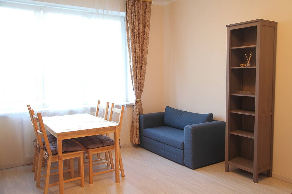 living room with natural oak flooring