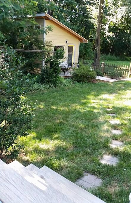 A stepping stone path takes you from the
house deck to your tiny house loft room...