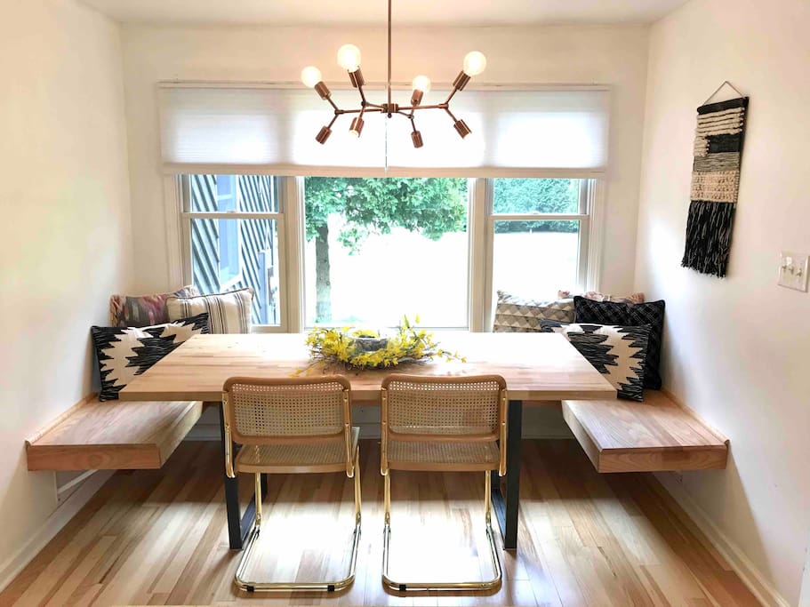 Breakfast nook, perfect place to start your day! Seating for 8+ opens up to the kitchen and living area, making one large space for everyone