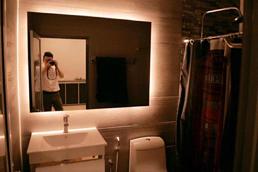 New renovated bathroom with rain shower heater