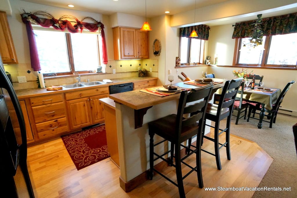 kitchen area with additional seating at bar