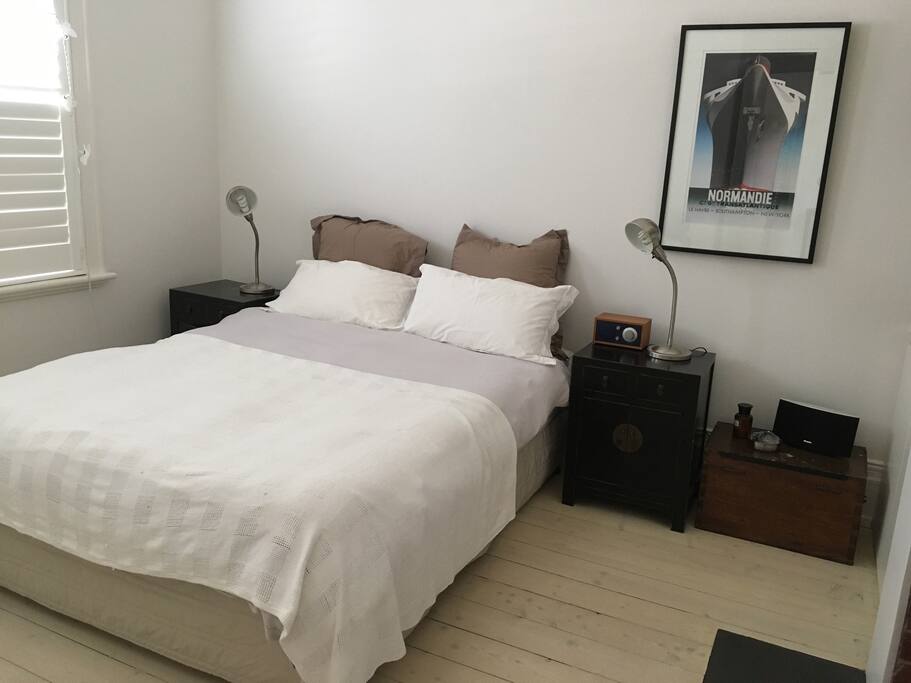 Beautifully designed bedroom. Queen size bed with Tivoli radio and speakers with USB port. Built-in wardrobe, storage and shelving. Plantation shutters. Heating. Whitewashed floorboards. Lots of light. Linen provided.
