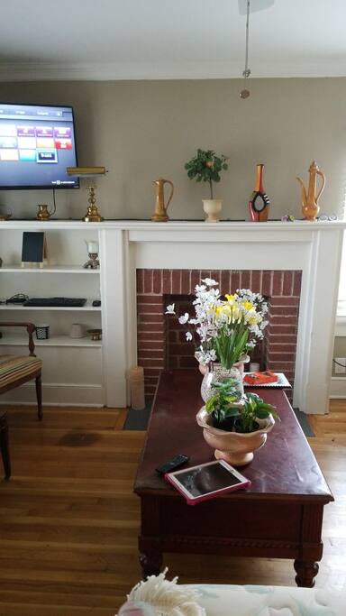 The Den/family room is spacious and has lot of windows and great lighting. A TV for days when you feel like staying in. The fireplace in this room adds to the cozy and relaxed ambiance.