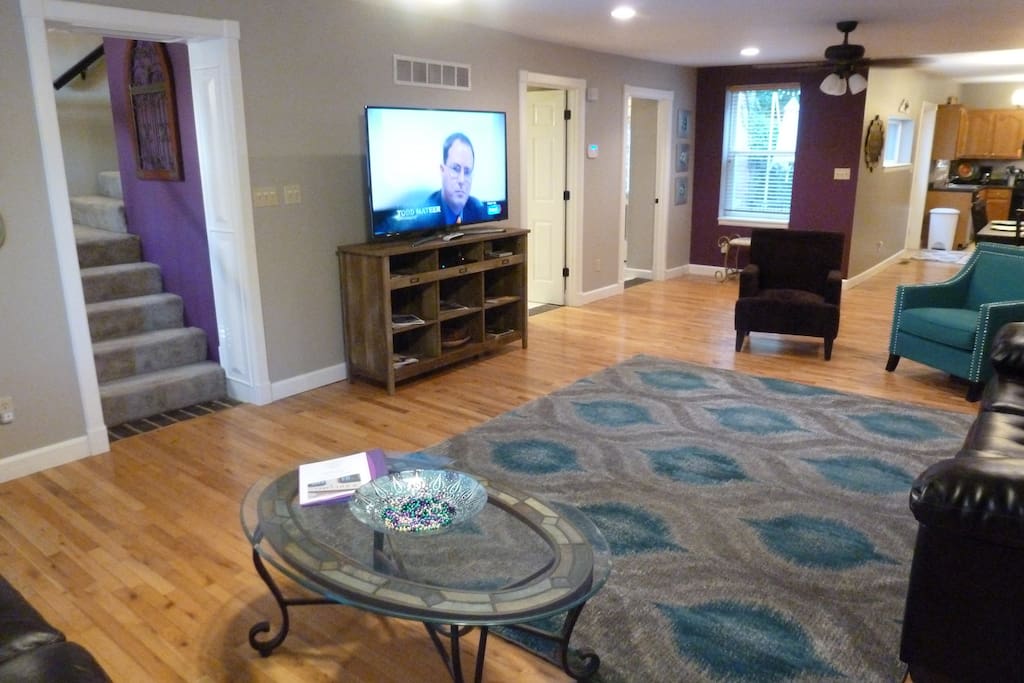 Great room with 60" flat panel with Direct TV.
