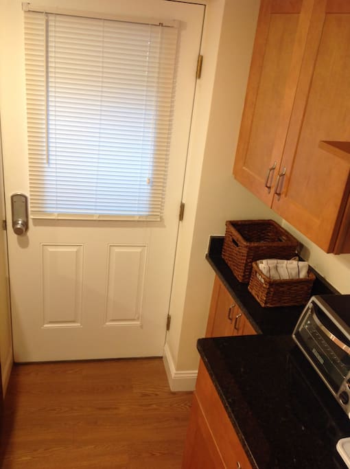 This unit is basement level with a single room with a private entrance from the exterior with its own sidewalk leading to the entrance stairs.