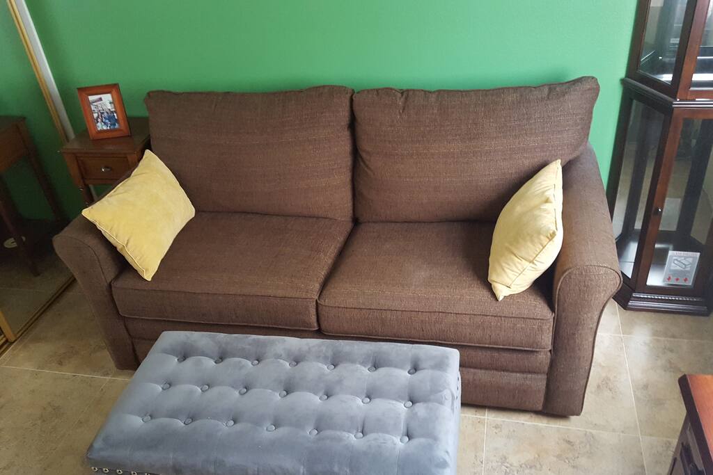 Cozy room couch by day