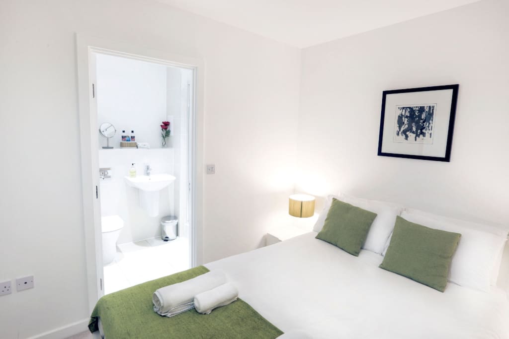 Comfortable and airy, the master bedroom is the perfect sanctuary to relax in, after a long day of sight-seeing.