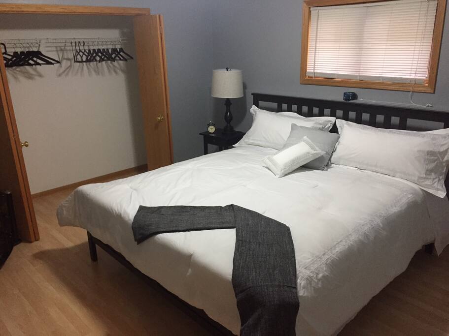 Clutter free closet with plenty of room to hang your clothes. Iron and ironing board in closet. For those that stay longer than 8 days will provide extra sheets in case will like to change them.