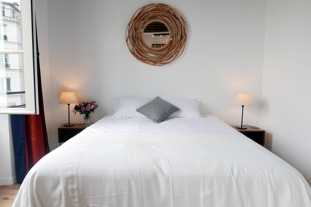 Latin Quarter -Bedroom1 offers a comfortable bed, storage & window