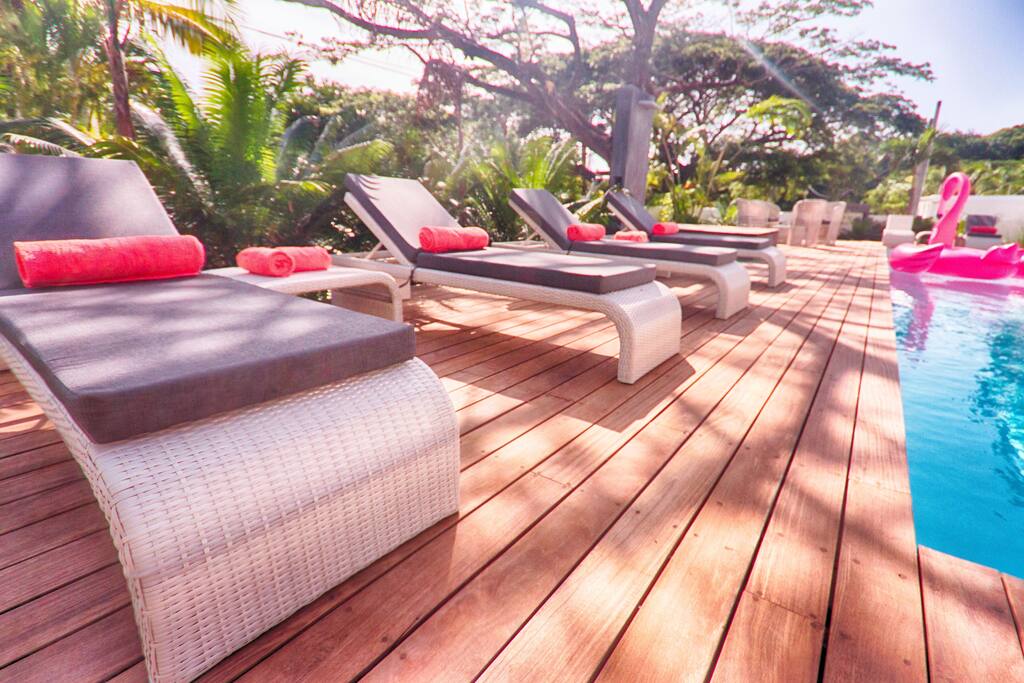 Casa-22 pool deck with lounge seats