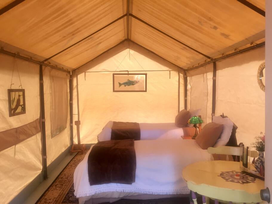 Roomy, light filled, tent/cabin. Fall asleep to froggy chorus and wake to bird song.