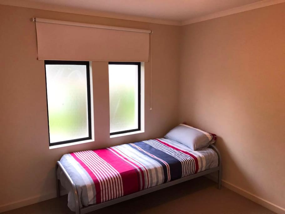 This is the 2nd large bedroom with single bed. Each bedroom has its own wardrobe.