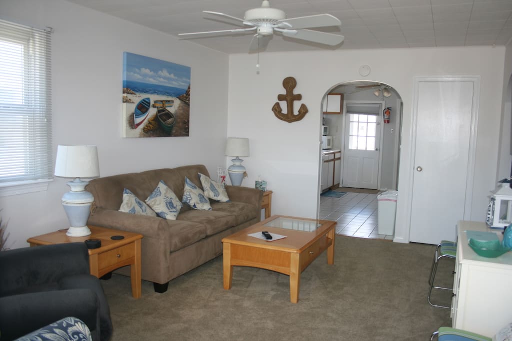Living room with 40" Cable TV and new seating