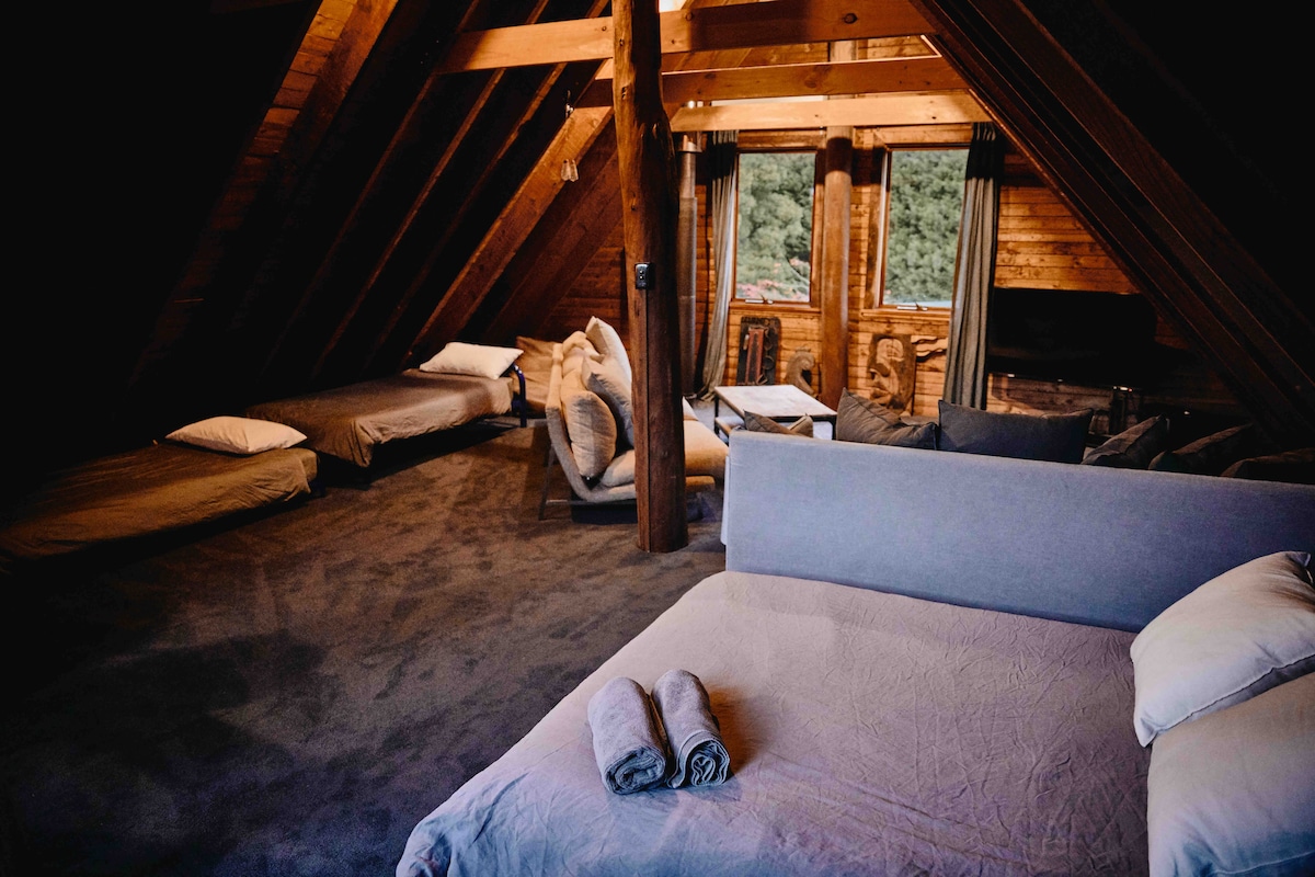 The loft upstairs, which can be set up with extra beds when you book for 10+ people.