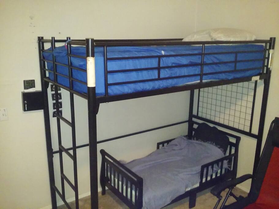 Twin bed over the toddler bed.