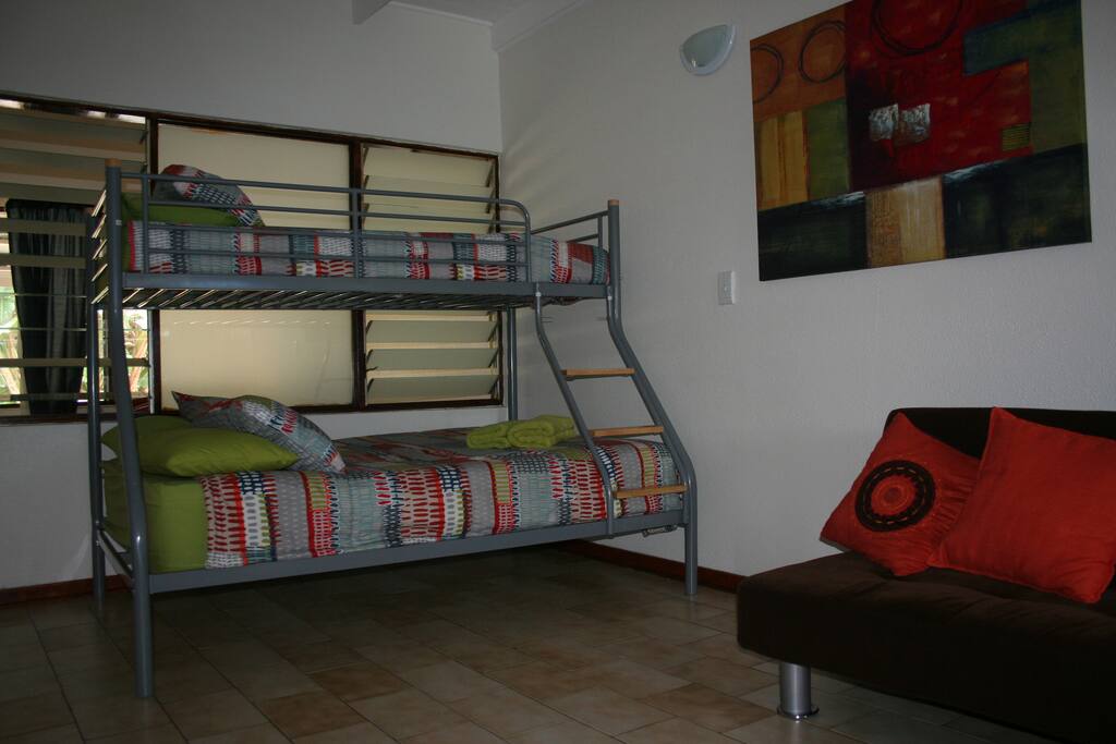 Open plan lounge with double/single bunk.