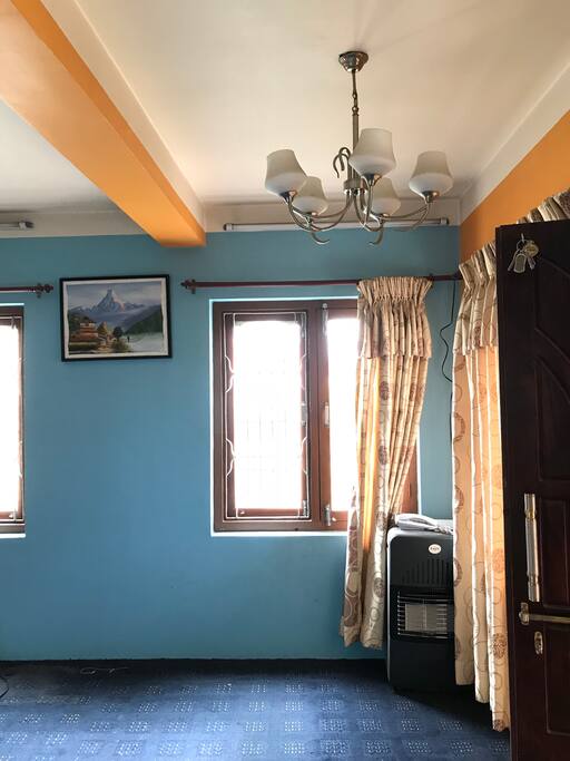 Cozy lounge including tv and sofa