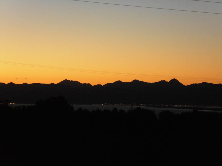The lights of Nelson at the foot of the Richmond Ranges.