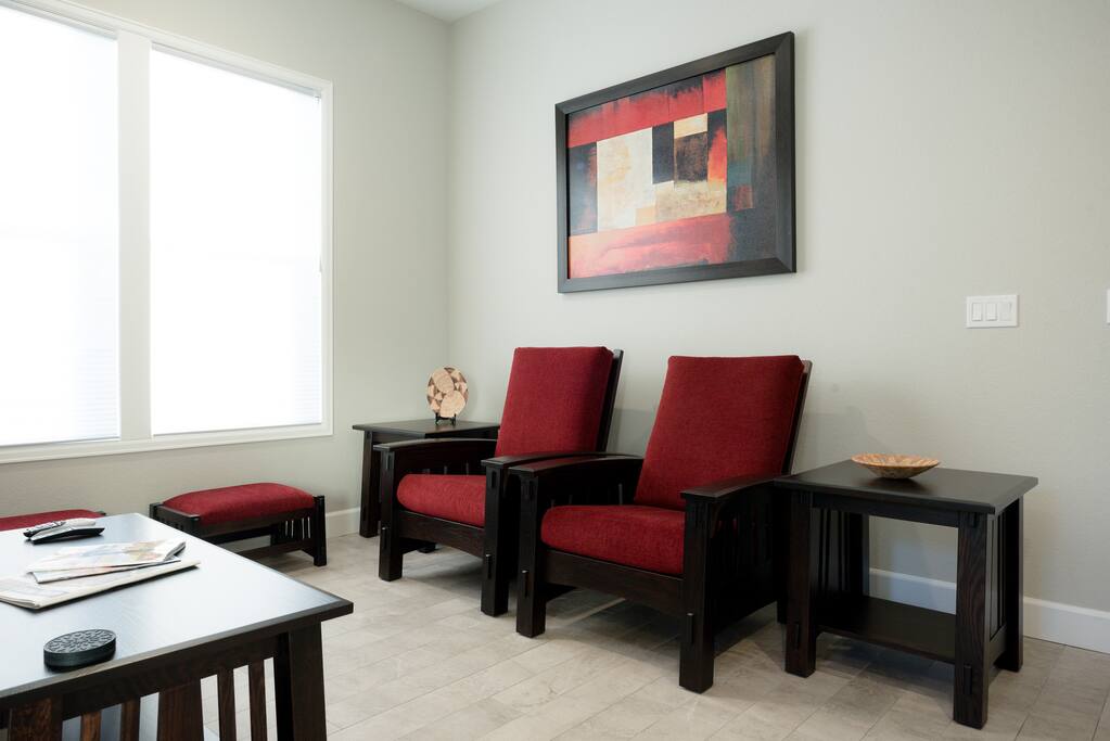 Spacious, comfortable sitting area w/ footstools & plenty of room to spread out.