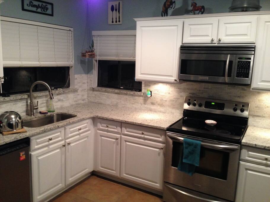 Clean bright Beautiful Kitchen with Sparkling Granite