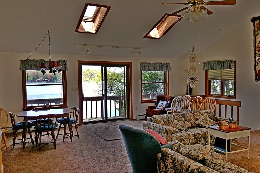 Living Room door opens to the balcony and the lake.