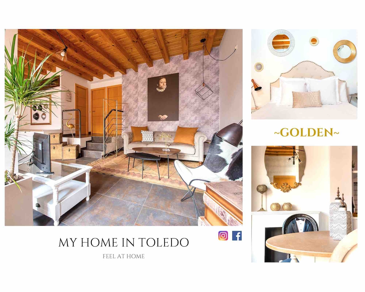 A stylish living area features elegant decor, a comfortable sofa, and a glass coffee table. The wooden ceiling and textured wall contribute to the inviting atmosphere. An accent wall displays a piece of art, adding a unique touch to the space.