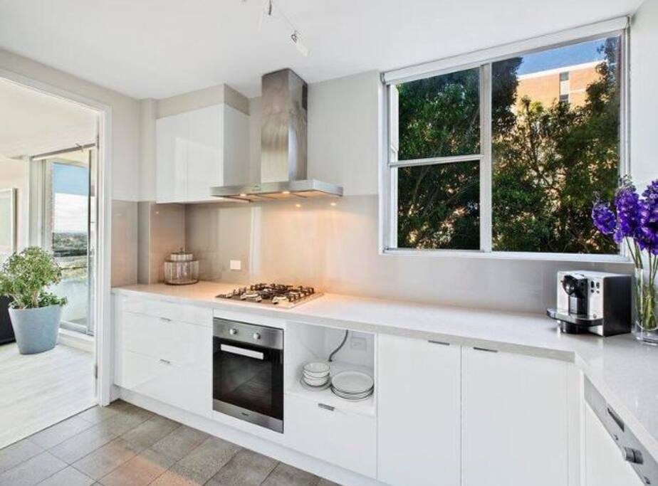 Modern, clean, spacious kitchen with Miele products, Nespresso coffee machine and anything else you need