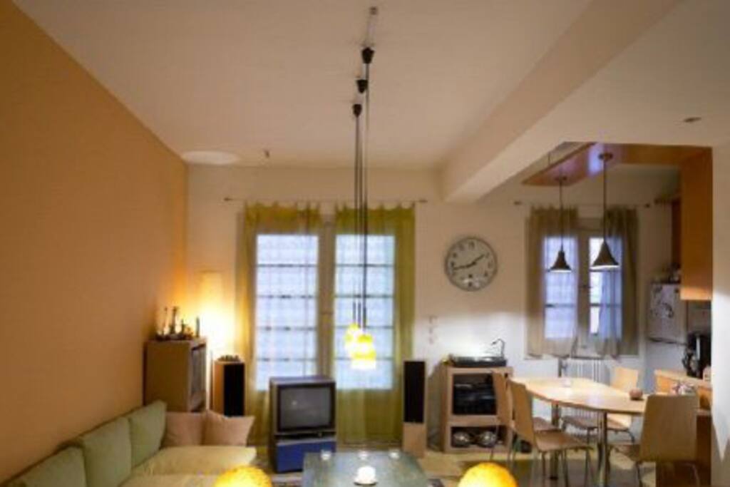 The cozy living room with an open kitchen