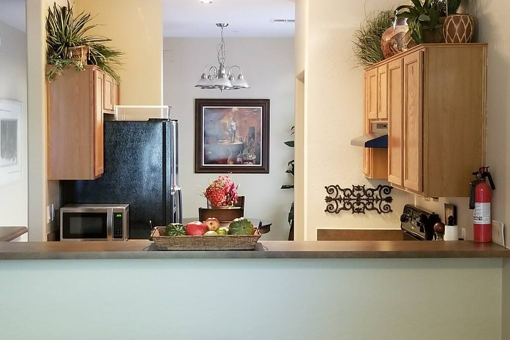 View from Living Room to Kitchen to Dining Room