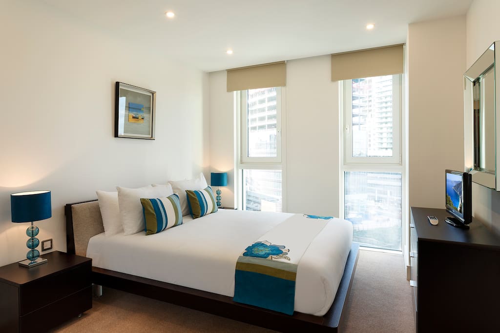 Comfortable Bedroom with flat screen TV