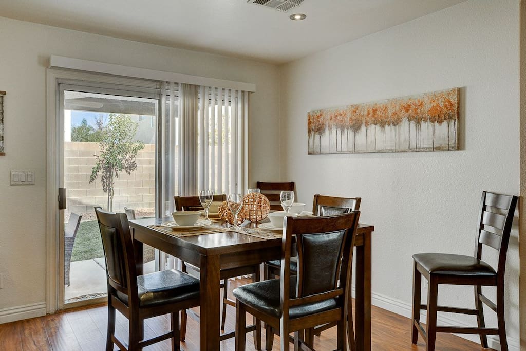 Dining room area with a lovely view of the backyard.