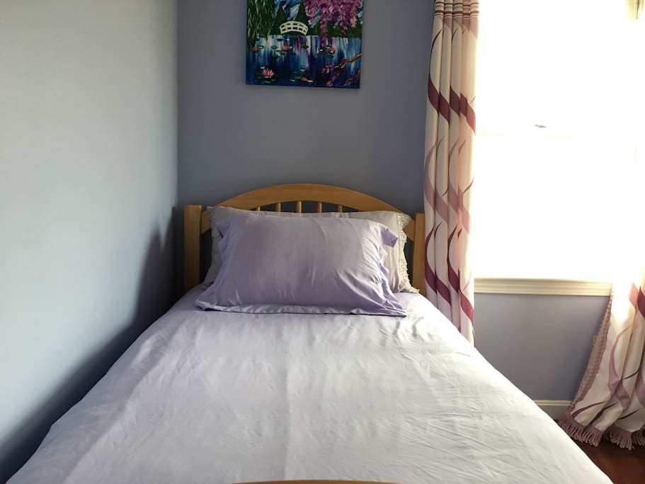 Bright and Sunny Standard Twin Bed Room with ample drawer and closet space