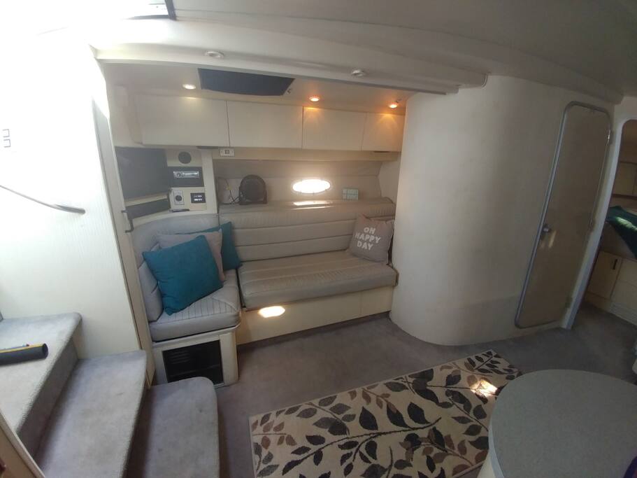 Couch, smart TV and convertible second bedroom.
