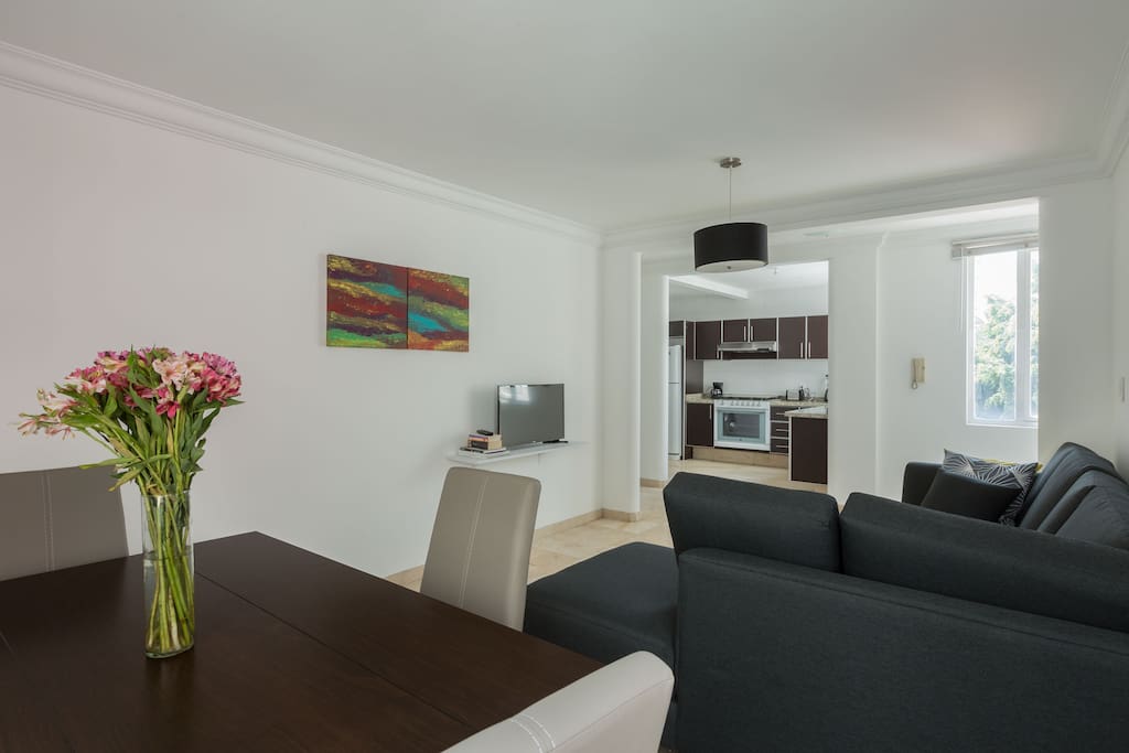 Spacious dining area, view of the beautiful living area and kitchen.