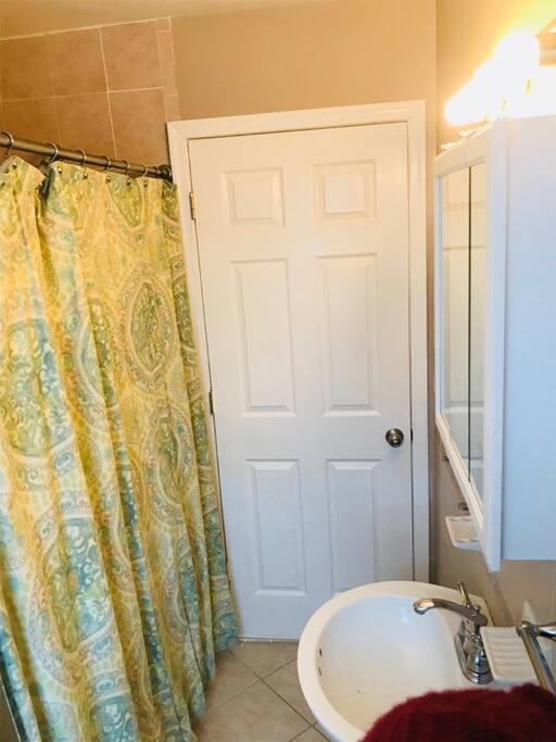 A shared full bathroom