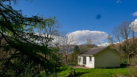 Quaint rustic cottage by riverside