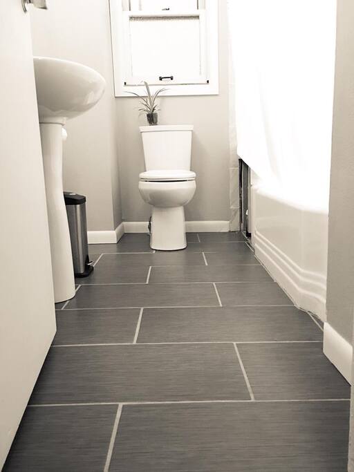 Recently remodeled bathroom with heated tiles.